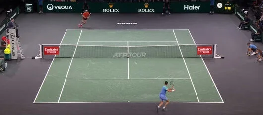 Tennis player hitting a forehand during an ATP Tour match, representing tennis betting markets.