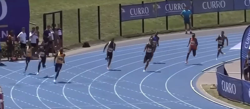 Athletics 400m race with athletes showing speed and competition on the track